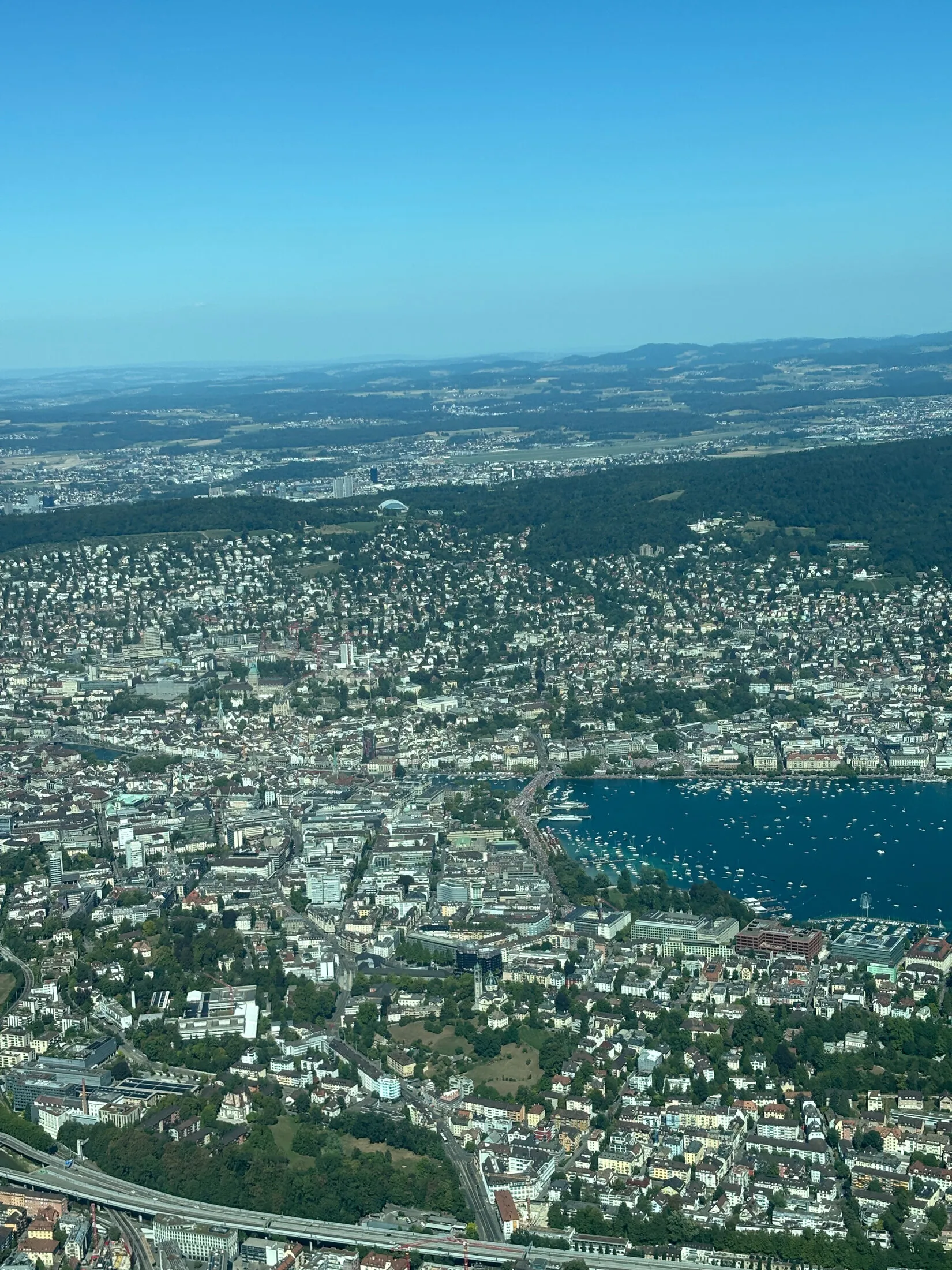 Aerial view of a city on a lake from the return flight